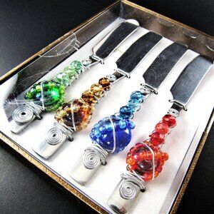 WILD EYE DESIGN SET OF 4 SPREADERS MULTI COLOR HANDLES NEW IN BOX RAINBOW